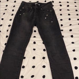 Blacked studded jeans